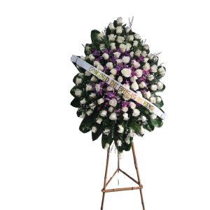 Corona fúnebre con rosas blancas y orquídeas hawaianas, entrega rápida en Cali