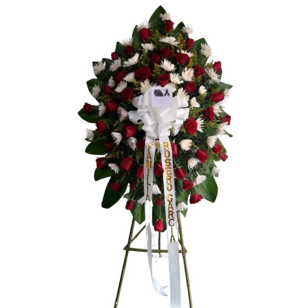 Corona fúnebre con rosas rojas y crisantemos blancos, entrega rápida en Cali